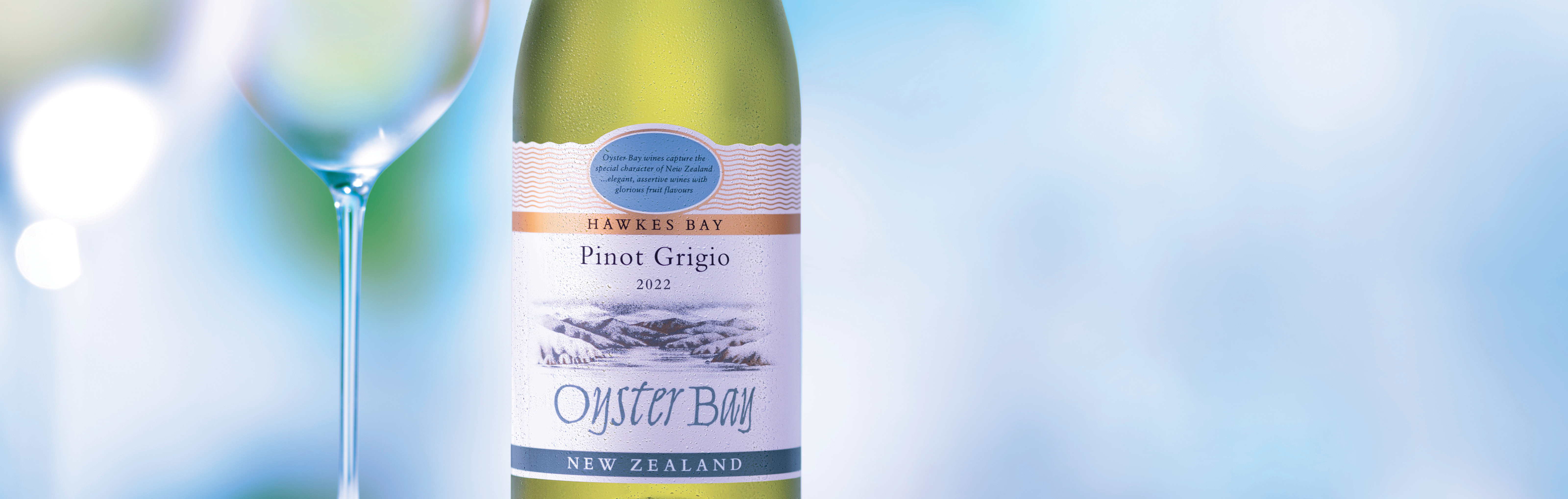 Oyster Bay Pinot Grigio bottle with two glasses