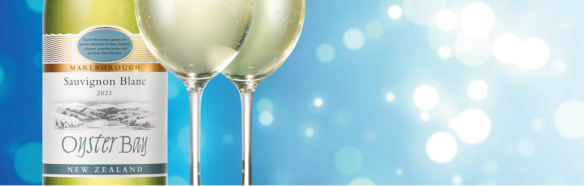 Oyster Bay Sauvignon Blanc bottle with two glasses Desktop AU NZ